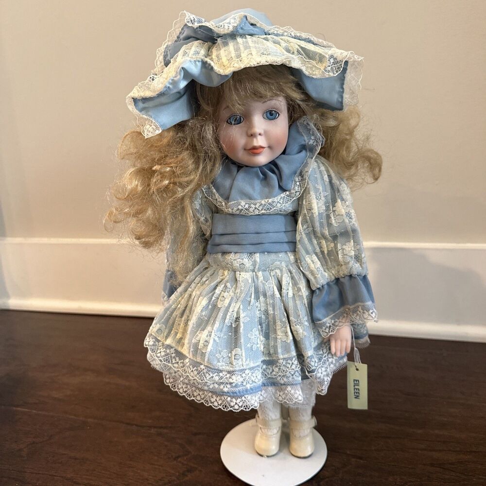 Dynasty Doll Collection Eileen Porcelain Doll Blue eyes dress blonde hair anna